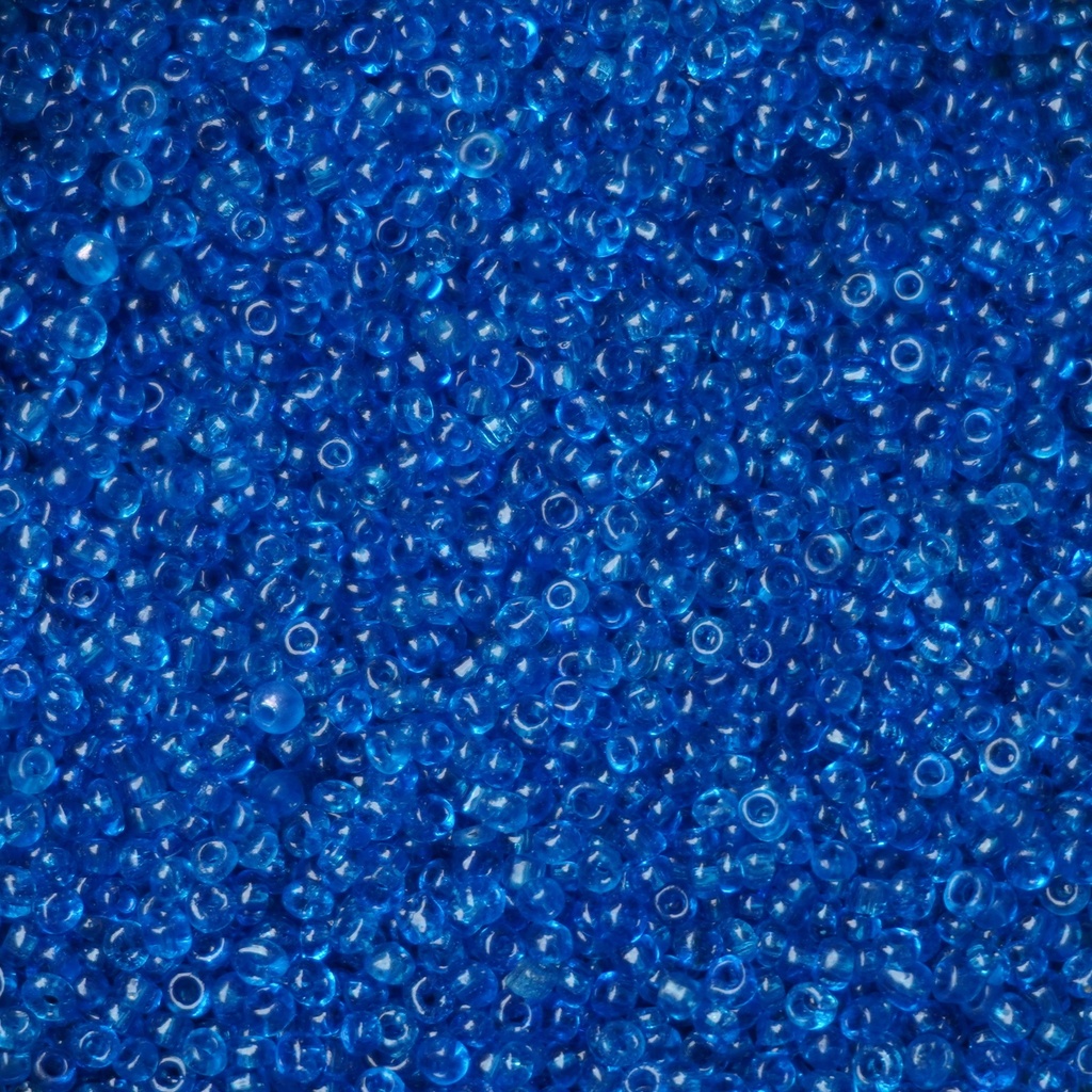 Perles de rocaille bleu translucide 8/0